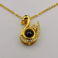 18K Yellow Gold Plated [I Love You in 100 Languages] Swan Lens Necklace - Offer Hunts